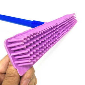 Multi-surface rubber broom