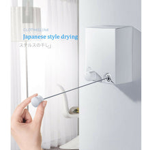 Image of Telescopic Stainless String Invisible Clothesline